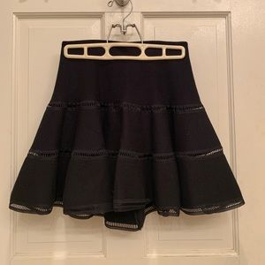 Black flare mini skirt with detailing